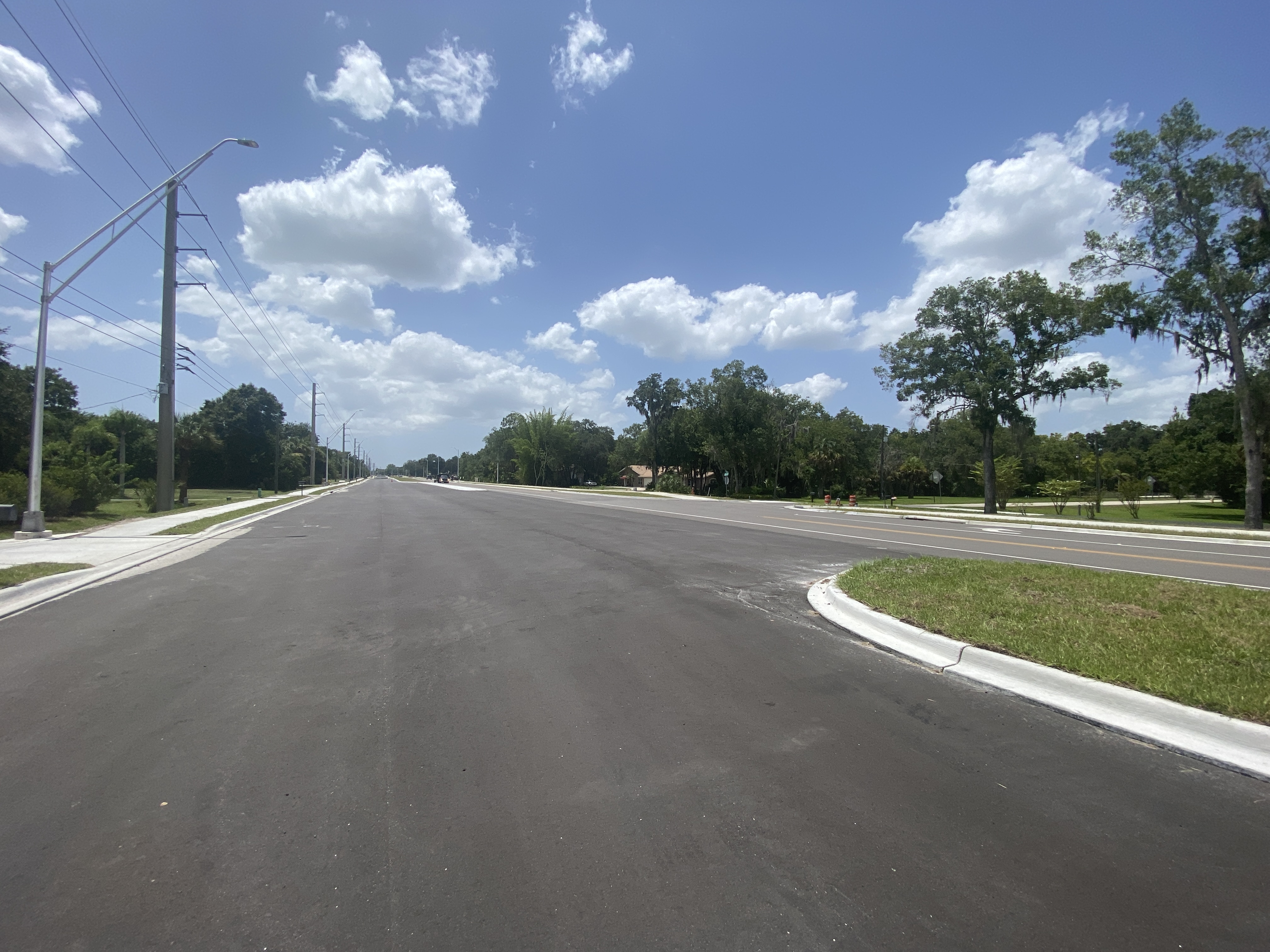 The newly paved eastbound travel lanes near 65th Street East